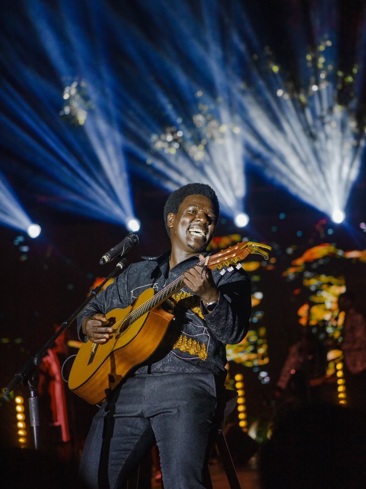 Mugabi's official biography describes his work as an attempt to merge African storytelling and contemporary music while encouraging cultural pride and awareness.